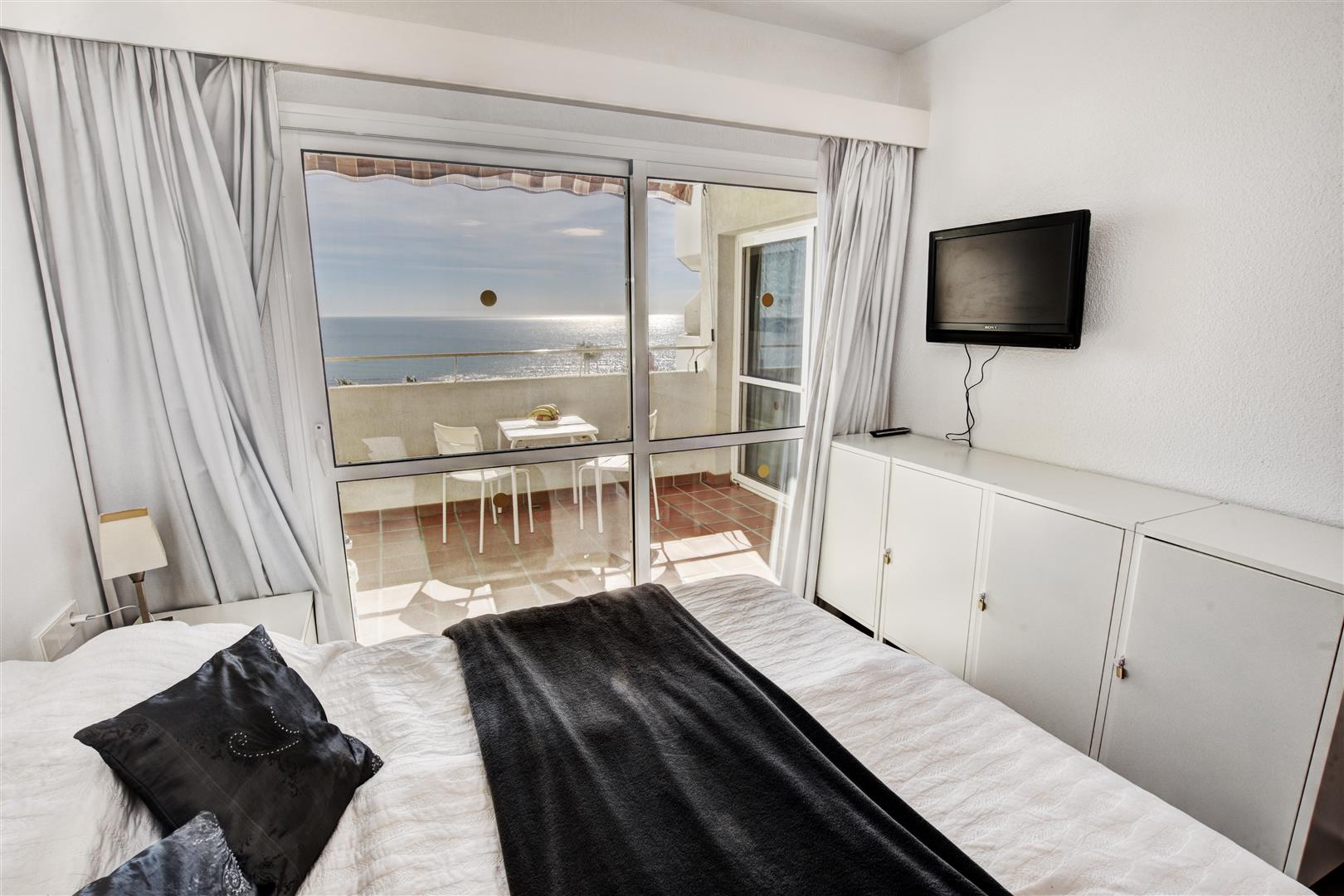 Beachfront apartment for sale in BenalBeach bedroom